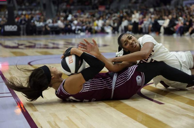 Image from: Angel Reese has no ill feelings for Isabelle Harrison despite receiving WWE-style slam, says WNBA analyst