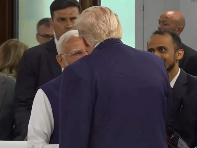 Image from: PM Modi, President Trump hold brief interaction after G7 family photo in France