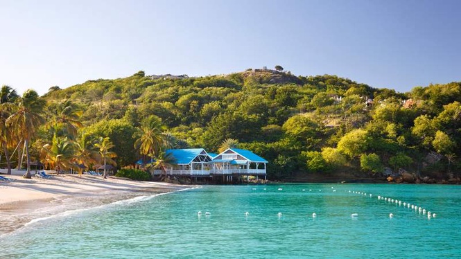 Image from: In the Caribbean, this lush island is often called the sunniest and most beautiful in the world (and with good reason!)