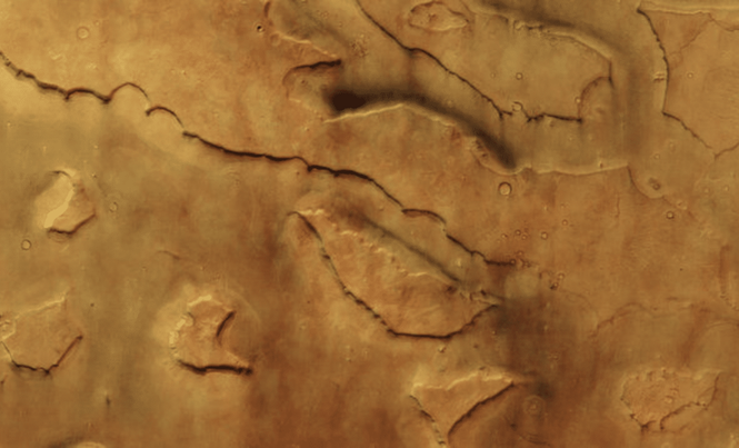 Image from: Mars Express Captures Giant Tornadoes Twisting Through Ancient Valleys
