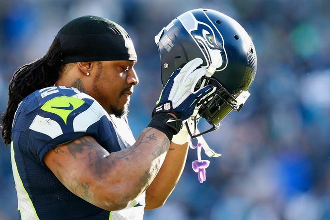 Image from: Ex-Seattle Seahawks NFL great Marshawn Lynch spotted in new role as World Cup photographer