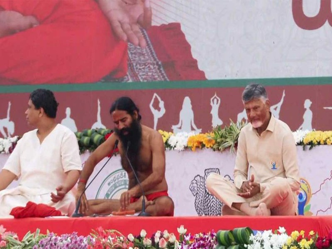Image from: Andhra Pradesh CM Chandrababu Naidu, Baba Ramdev lead 12th International Yoga Day celebrations in Vijayawada