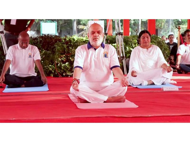 Image from: Home Minister Amit Shah, Gujarat CM Bhupendra Patel participate in Yoga Day events in Gujarat