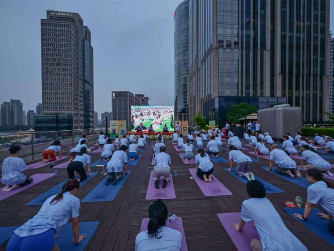 Image from: Consulate General of India in Shanghai hosts International Day of Yoga at Bund Finance Centre
