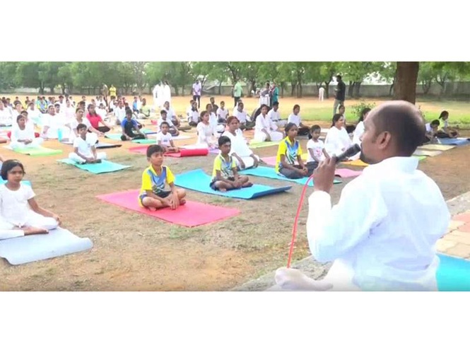 Image from: Tamil Nadu: Over 500 people perform yoga in Tiruchirappalli on 12th International Yoga Day