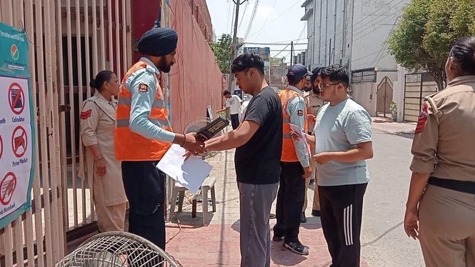Image from: Tight security in place for NEET-UG re-examination at 11 centres in Amritsar