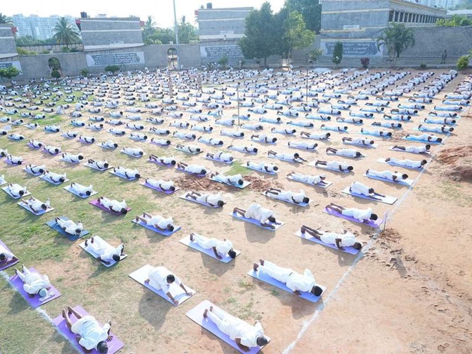 Image from: Inmates perform yoga in Bengaluru prison on 12th International Yoga Day, says DG Alok Kumar