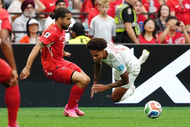 Image from: Swiss beat qualified Canada to snatch top spot, Bosnians left to hope