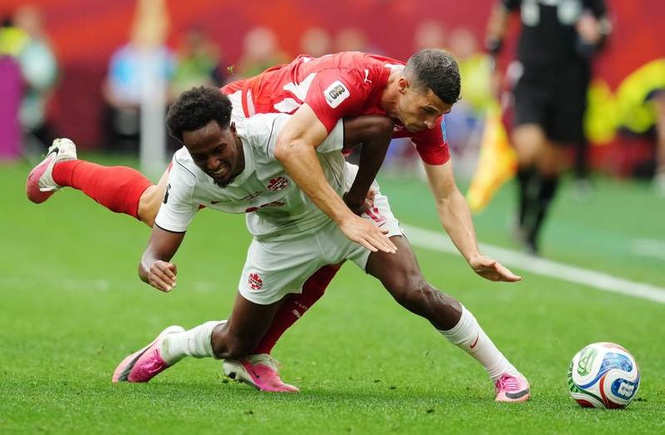 Image from: Swiss beat qualified Canada to snatch top spot, Bosnians also through