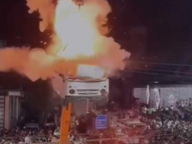 Image from: MP Police file FIR against 4 people after stunt involving a hanging car and explosives goes viral