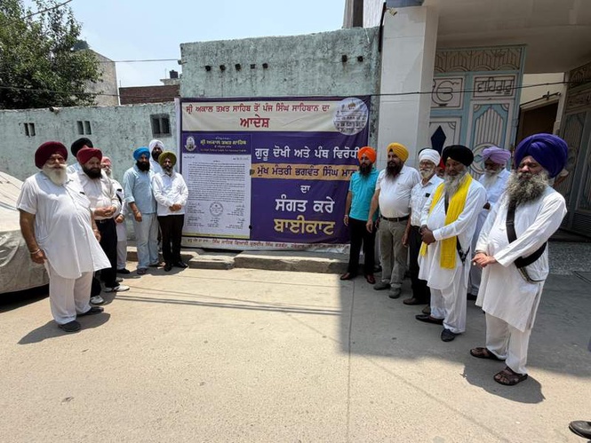 Image from: Posters targeting Mann, Badal surface across Ludhiana gurdwaras