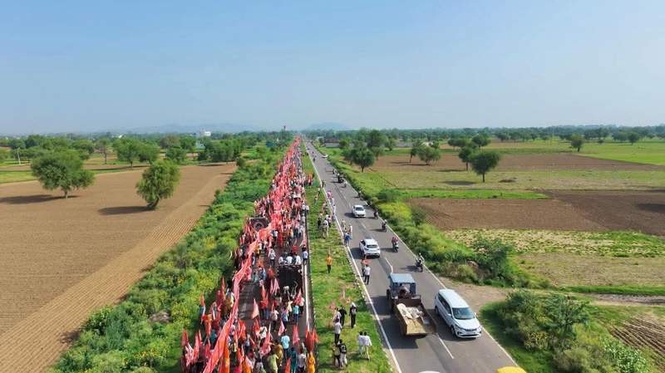 Image from: Pali Dham in Mahendragarh eyes world record with 1,100-metre-long saffron flag procession