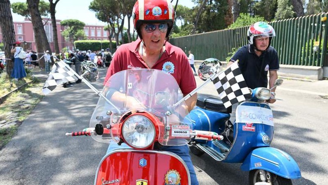 Image from: ‘Vespa is a way of life’: Thousands ride through Rome as Italy’s iconic scooter turns 80