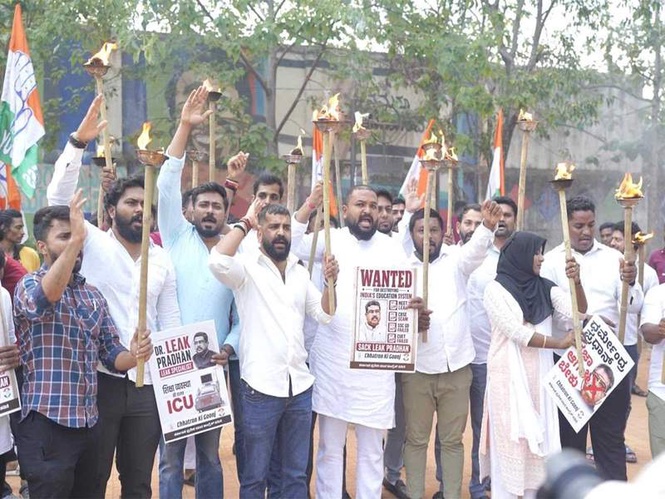 Image from: Bengaluru: Youth Congress holds torchlight rally demanding Dharmendra Pradhan's resignation