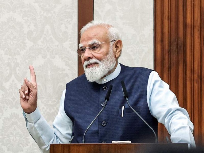 Image from: Government is extending protective shield of insurance to crores of families: PM Modi in 'Mann Ki Baat'