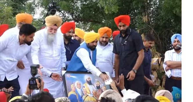 Image from: Mann targets Akalis, Congress at Faridkot Lok Milni; farmers’ leaders detained