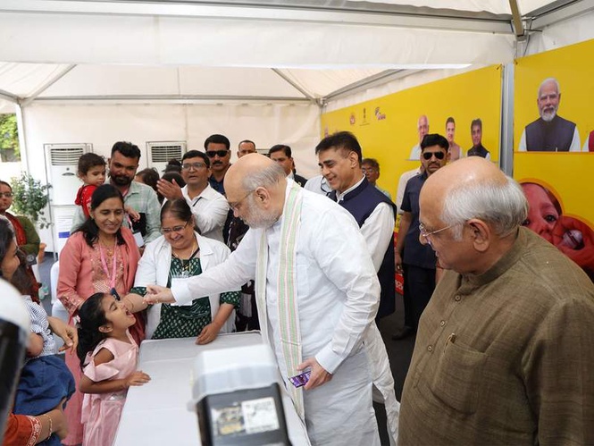 Image from: Gujarat: Amit Shah launches PM Family care tracker, says Modi govt ensured direct transfer of welfare benefits