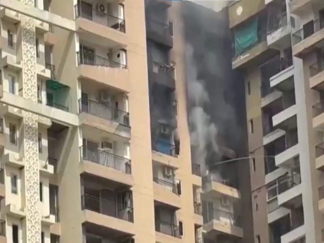 Image from: UP: Fire breaks out at Sector 119 Noida's Aranya Society; CM Yogi orders swift rescue, relief for affected