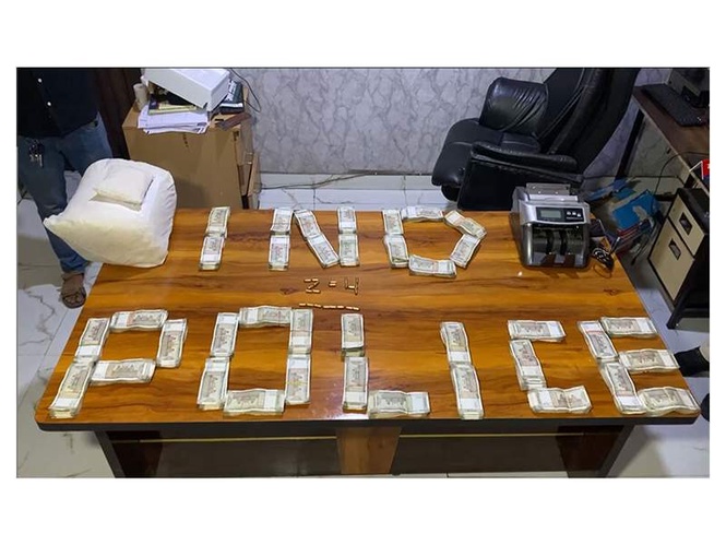 Image from: MP: Police nabs drug supplier in Indore, recovers 265 gm brown sugar, Rs 19 lakh cash, 22 live pistol cartridges