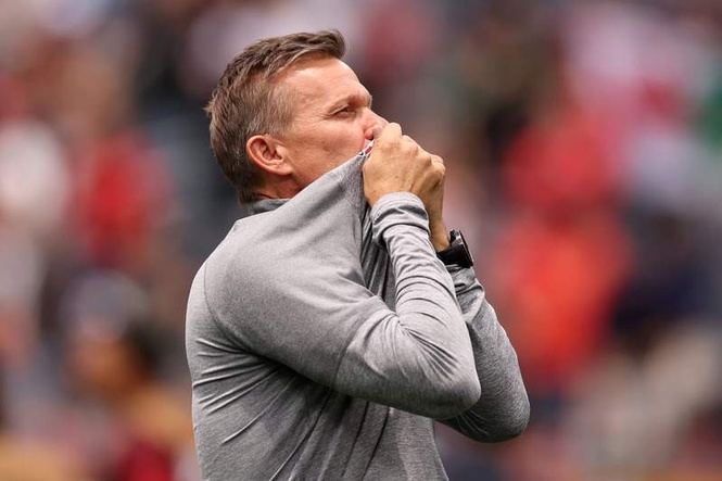 Image from: Jesse Marsch criticized for kissing Canada badge after World Cup win