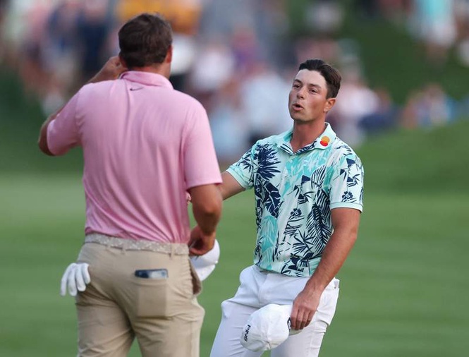 Image from: Scottie Scheffler’s instant reaction after missing putt to lose Travelers playoff to Viktor Hovland