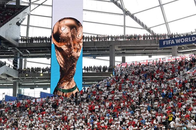 Image from: Watch the brilliant moment DR Congo fan celebrates opening goal surrounded by England fans