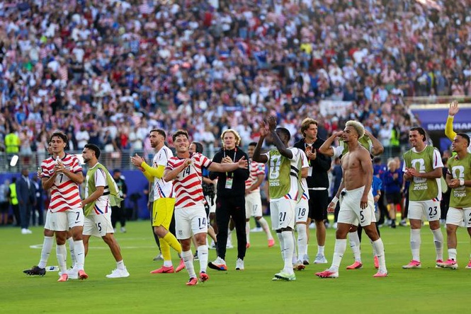 Image from: Ten-man US into last 16 after gutsy win over Bosnia and Herzegovina