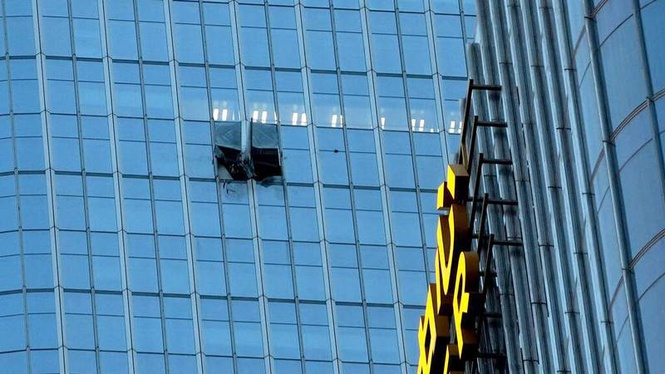 Image from: Pilot who hit Beijing's tallest tower wrote about 'ending his life', officials say