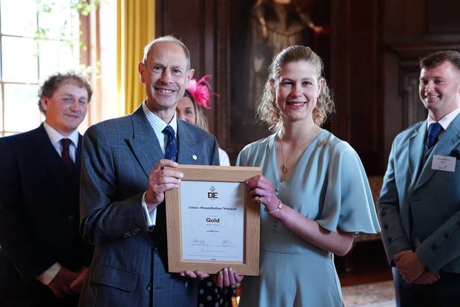 Image from: Lady Louise receives Duke of Edinburgh award from Prince Edward as Sophie watches on proudly