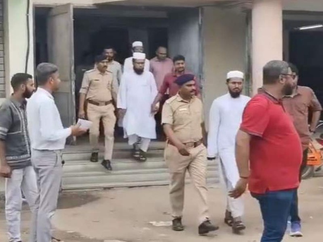 Image from: Gujarat ATS arrests 8 accused associated with terror outfit JeM, sent to 14-day police remand
