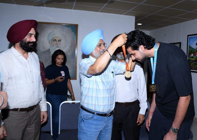 Image from: Aiming for gold, honoured at home: GNDU fetes medal-winning shooters