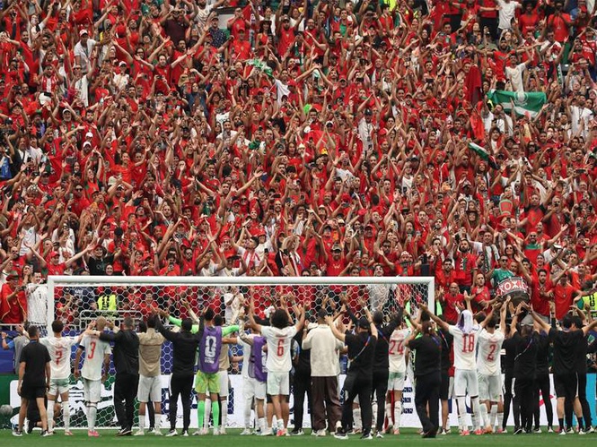 Image from: FIFA World Cup 2026: Morocco players celebrate quarter-final berth with fans after dominant win over Canada