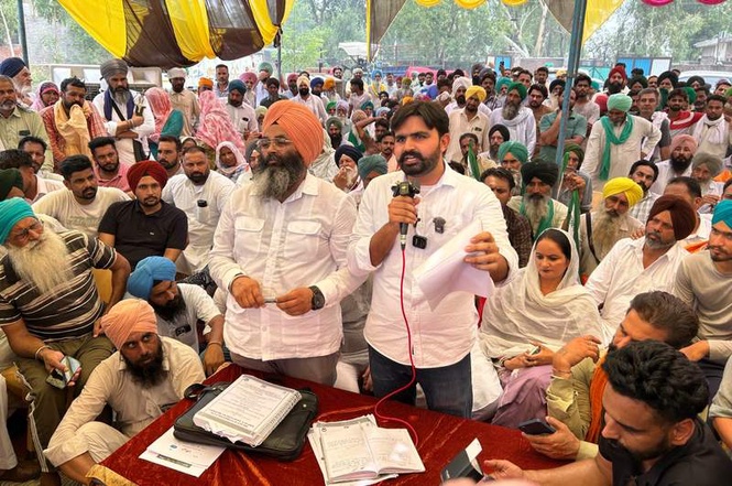 Image from: Villagers, environmental activists oppose proposed cement plant during public hearing in Bathinda village