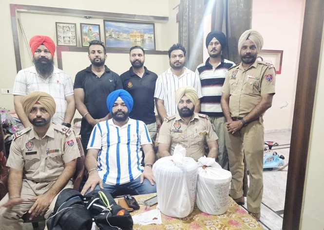 Image from: Twin ops lead to seizure of 13 kg heroin, 3 held