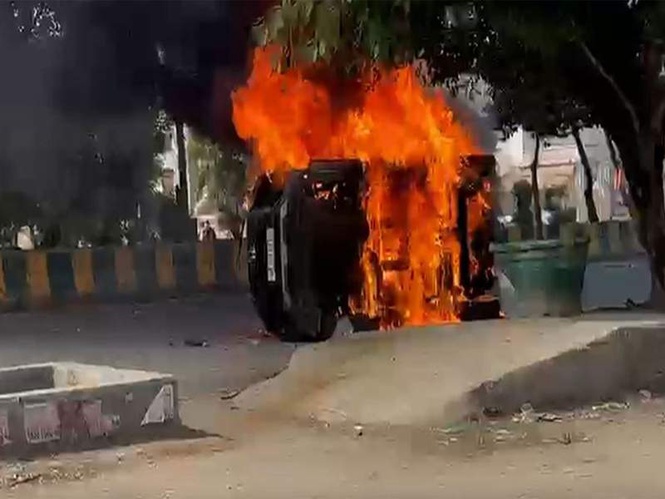 Image from: Uttar Pradesh: Workers' protest for salary hike turns violent in Noida Phase 2, police deployed