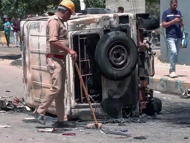 Image from: UP Police arrest two people involved in Noida workers' protest