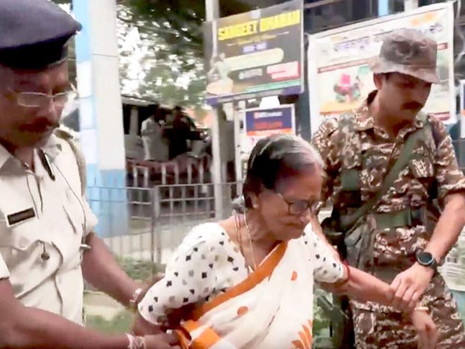 Image from: WB polls: Security forces officials assist elderly voters to cast their votes