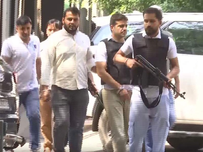 Image from: Court grants 7-day custody of Rohit Chaudhary to Delhi Police in fake passport case