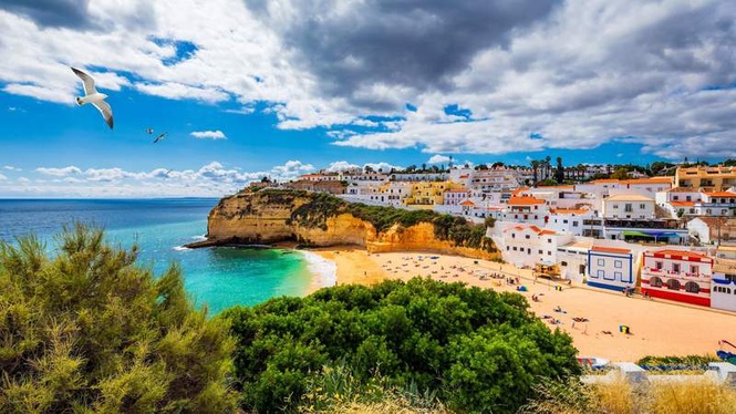 Image from: In the Algarve, this village nestled between cliffs and coves is one of the most spectacular in Portugal