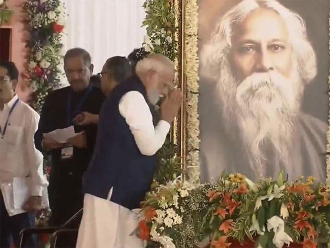 Image from: PM Modi pays tribute to Rabindranath Tagore on his 165th birth anniversary ahead of West Bengal CM swearing-in ceremony