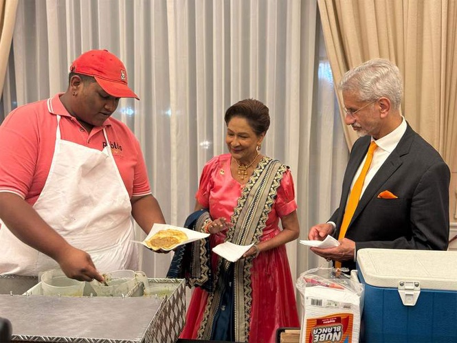 Image from: Doubles of Flavour: EAM enjoys "true taste" of Trinidad & Tobago with PM Persad-Bissessar