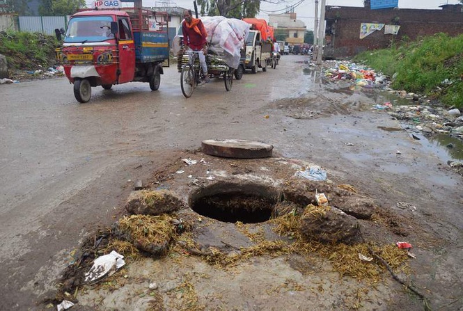 Image from: Open house: Are faulty manholes across city a sign of civic neglect & Should the MC be held accountable?