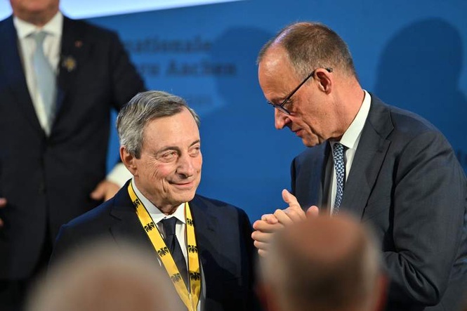 Image from: Merz hails 'Super Mario' Draghi as ex-ECB boss given Charlemagne Prize
