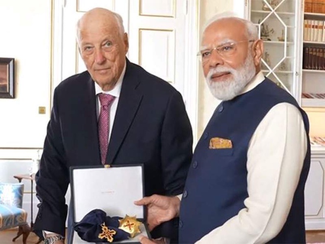 Image from: Norway confers its highest honour, Grand Cross of the Royal Norwegian Order of Merit, on PM Modi