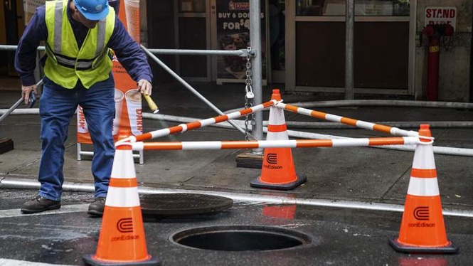 Image from: New York woman dies after falling into open manhole after exiting car