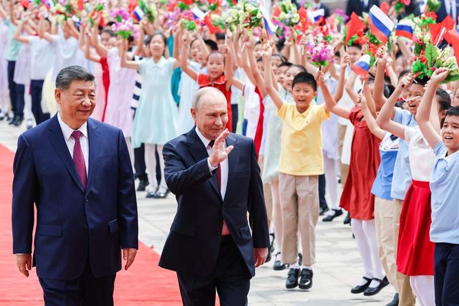Image from: Putin hails Russia-China ties as ‘stabilizing’ force on Beijing visit