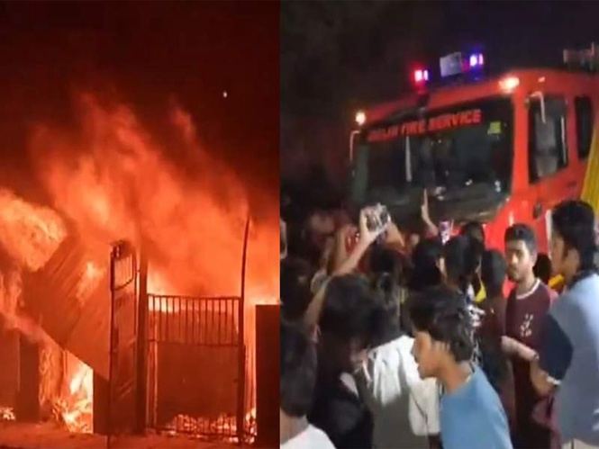 Image from: Delhi Shastri Park furniture market fire: Angry locals pelt stones at fire tenders over reported delay in initial response