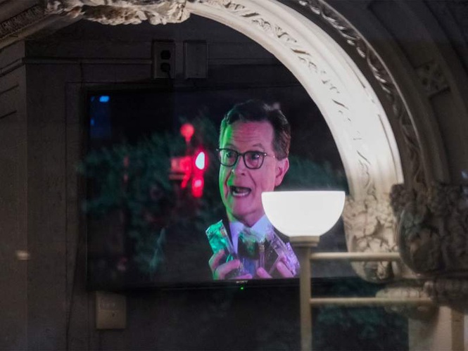 Image from: Trump shares AI video of throwing The Late Show host Stephen Colbert into bin
