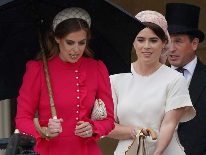 Image from: Beatrice and Eugenie's attendance at royal wedding hangs in the balance