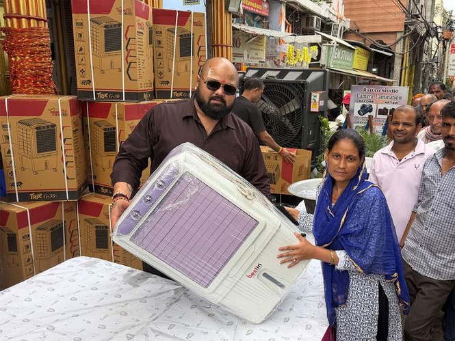 Image from: World Champion Mahant Gaurav Sharma distributes air coolers to needy people on his birthday
